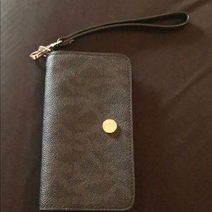 Micheal Kors iPhone wallet. Brand new
